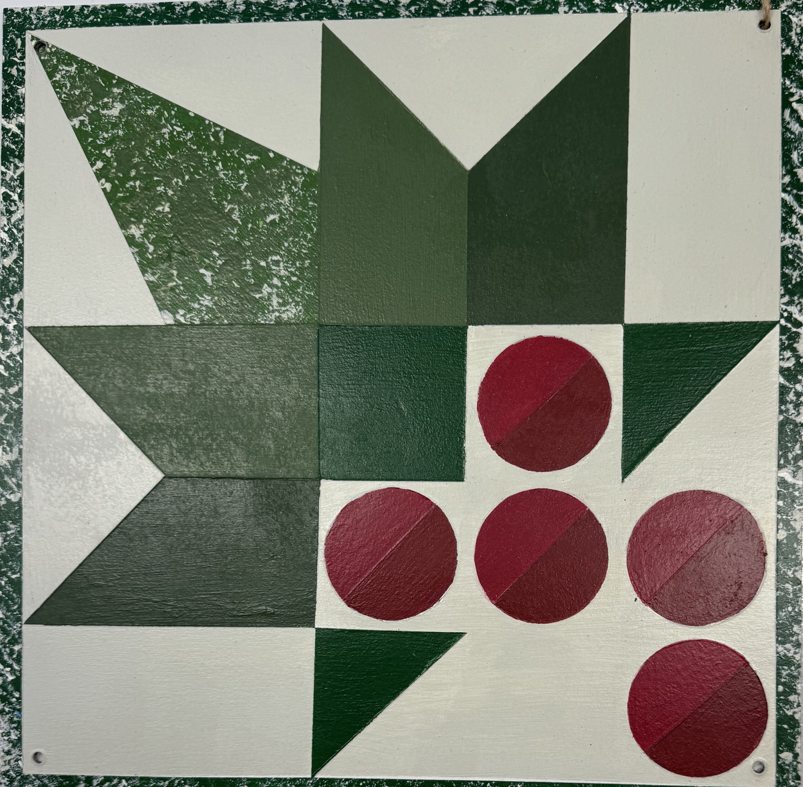 Colorful geometric design featuring dark green triangles and red circles on a white background, showcasing artistic patterns typical in folk art.